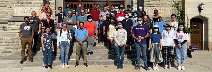 People standing outside of a campus building